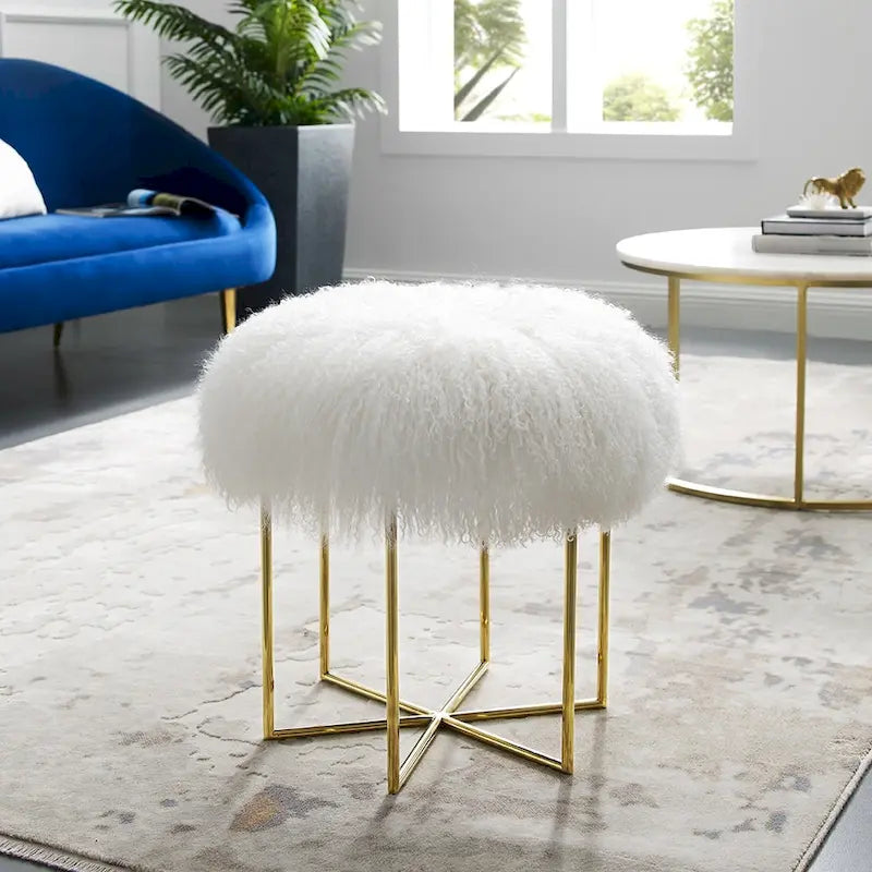 Pouf rotondo in pelle di pecora con base in acciaio inossidabile